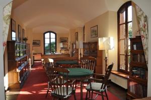 Posedenie v ubytovaní The Golf Club Guest House