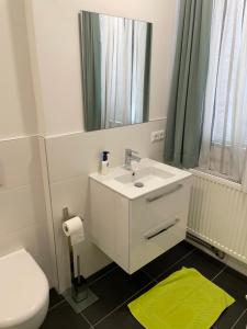 Koupelna v ubytování Hotel Garni Ilys Inn