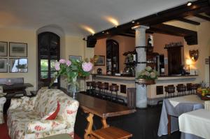 Posedenie v ubytovaní The Golf Club Guest House