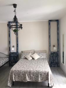 Postel nebo postele na pokoji v ubytování Casa Daflanna in Salento - Libeccio (monolocale)