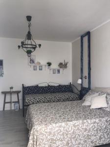 Postel nebo postele na pokoji v ubytování Casa Daflanna in Salento - Libeccio (monolocale)