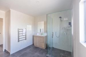 Koupelna v ubytování Lake Breeze Motel + 37 fotografií