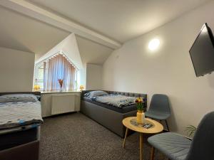 A bed or beds in a room at Hotel COLCHI