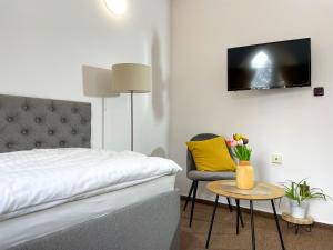 A bed or beds in a room at Hotel COLCHI