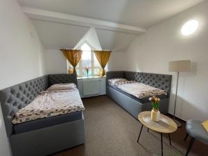 A bed or beds in a room at Hotel COLCHI