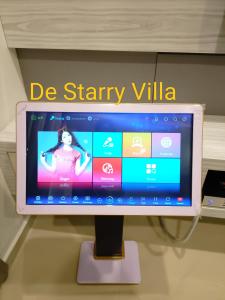 a computer monitor with a sign that says be starry villa at Melaka Homestay with pool 4BR Semi-D,BBQ,KTV,Billiard 15pax DeStarryVilla in Malacca