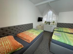 A bed or beds in a room at Hotel COLCHI