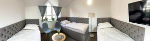 A television and/or entertainment centre at Hotel COLCHI