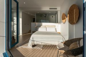 Cama o camas de una habitación en O mar de preciosa