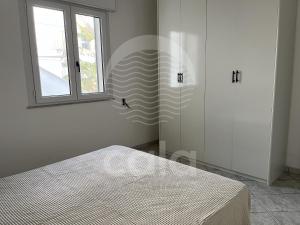 En eller flere senge i et værelse på Casa Picci By Cala Salento