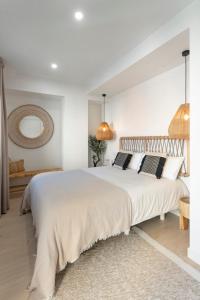 Cama o camas de una habitación en O mar de preciosa