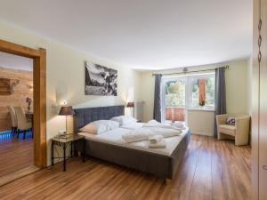 Posteľ alebo postele v izbe v ubytovaní Alpenlodge, Ferienwohnung 5