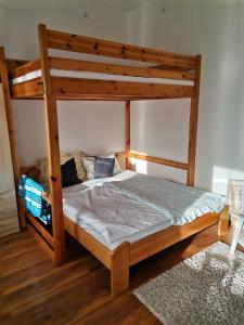 Posteľ alebo postele v izbe v ubytovaní Malomszeg Apartman 3