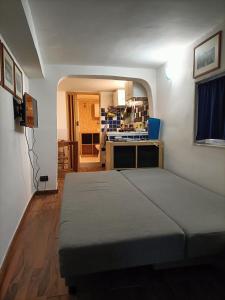 Postel nebo postele na pokoji v ubytování HOLIDAY HOME presso TERME DELLA ROTONDA