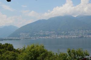 a view of a large body of water with mountains at Residenza Viramonte, Casa Daniela, Appartement 37 in Vira