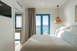 Cama o camas de una habitación en O mar de preciosa