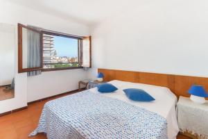 Posteľ alebo postele v izbe v ubytovaní Charme Apartament Palamós