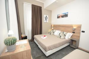 Postel nebo postele na pokoji v ubytování Hotel Crisvan