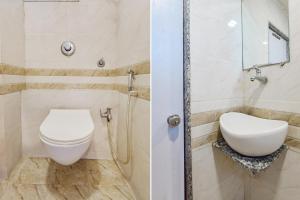 a bathroom with a toilet and a sink at FabExpress Apollo - Nr Odhav Ring Road in Naroda +25 photos
