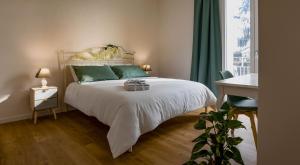 Postel nebo postele na pokoji v ubytování B&B Quattro Stagioni Charme and Wellness
