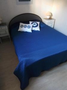 Postel nebo postele na pokoji v ubytování Maison Didonnette Quartier du Parc Royan