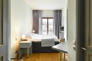 Postel nebo postele na pokoji v ubytování Le Palace Hotel