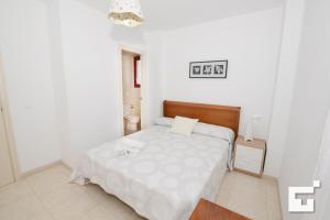Posteľ alebo postele v izbe v ubytovaní Apartamento Amatista 29A - Grupo Turis + 24 fotografií