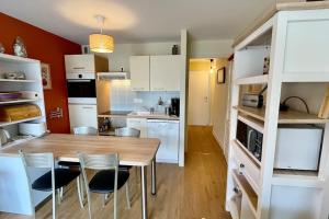 Kuchnia lub aneks kuchenny w obiekcie Appartement MerliDunes Proche de la plage