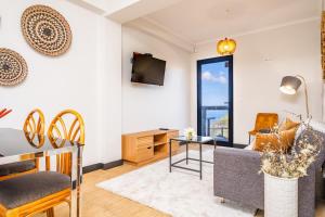 Posezení v ubytování Ocean Panorama Apartments by Homie