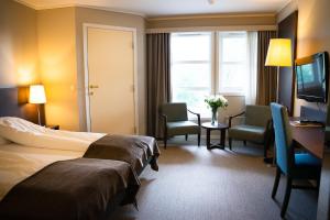 Postel nebo postele na pokoji v ubytování Bryne Hotell + 37 fotografií