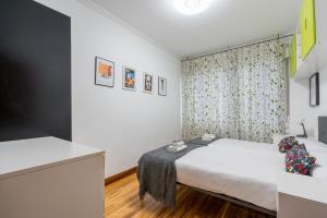 Posteľ alebo postele v izbe v ubytovaní Ybarra apartment by People Rentals