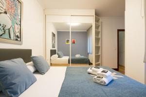 Posteľ alebo postele v izbe v ubytovaní Ybarra apartment by People Rentals