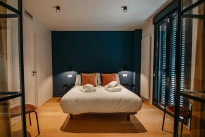 Cama o camas de una habitación en tuGuest Obispo Apartment