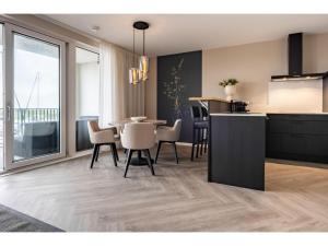 Kuchyň nebo kuchyňský kout v ubytování Loft Apartment by Veerse Meer Marina