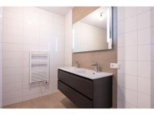 Koupelna v ubytování Loft Apartment by Veerse Meer Marina + 26 fotografií