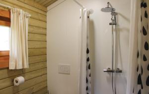 a bathroom with a shower with a shower curtain at Camping 't Ol Gat in Zoutkamp