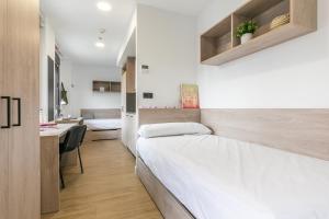 Postel nebo postele na pokoji v ubytování Micampus Madrid Sinesio Delgado Student Residence + 71 fotografií