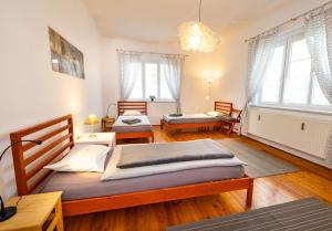 Postel nebo postele na pokoji v ubytování Ferienwohnung ALEX