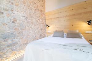 Posteľ alebo postele v izbe v ubytovaní Domina Boutique Apartment