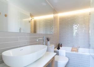 Kúpeľňa v ubytovaní Domina Boutique Apartment + 14 fotografií