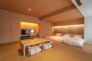Postel nebo postele na pokoji v ubytování Lime Resort Myoko + 37 fotografií