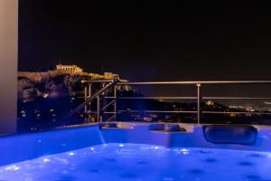 The swimming pool at or close to Majestic Acropolis-Lycabettus