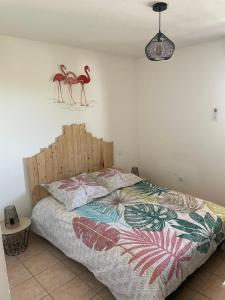 Posteľ alebo postele v izbe v ubytovaní Arles appartement climatisé proche centre-ville