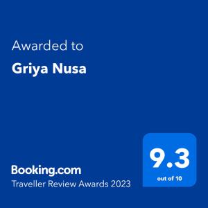 Ett certifikat, pris eller annat dokument som visas upp på Griya Nusa