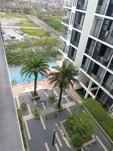 A view of the pool at Mupify Homestay Gala City Gala Residences A7 or nearby