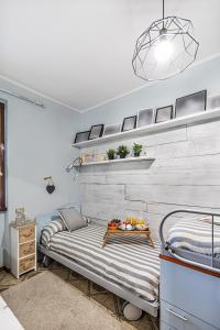 Ένα ή περισσότερα κρεβάτια σε δωμάτιο στο Residence Elena 19-B by Wonderful Italy +29 φωτογραφίες