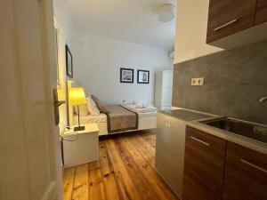 A kitchen or kitchenette at Just Studios