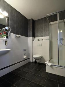 Koupelna v ubytování Comfort Hotel tom Kyle