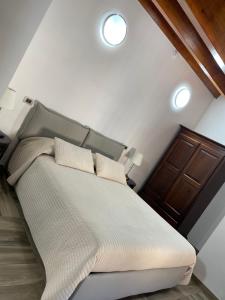 Postel nebo postele na pokoji v ubytování Palazzo Candida B&B