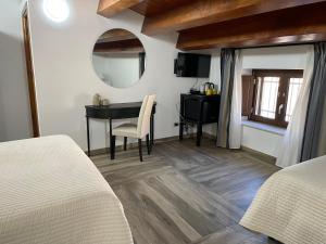Postel nebo postele na pokoji v ubytování Palazzo Candida B&B